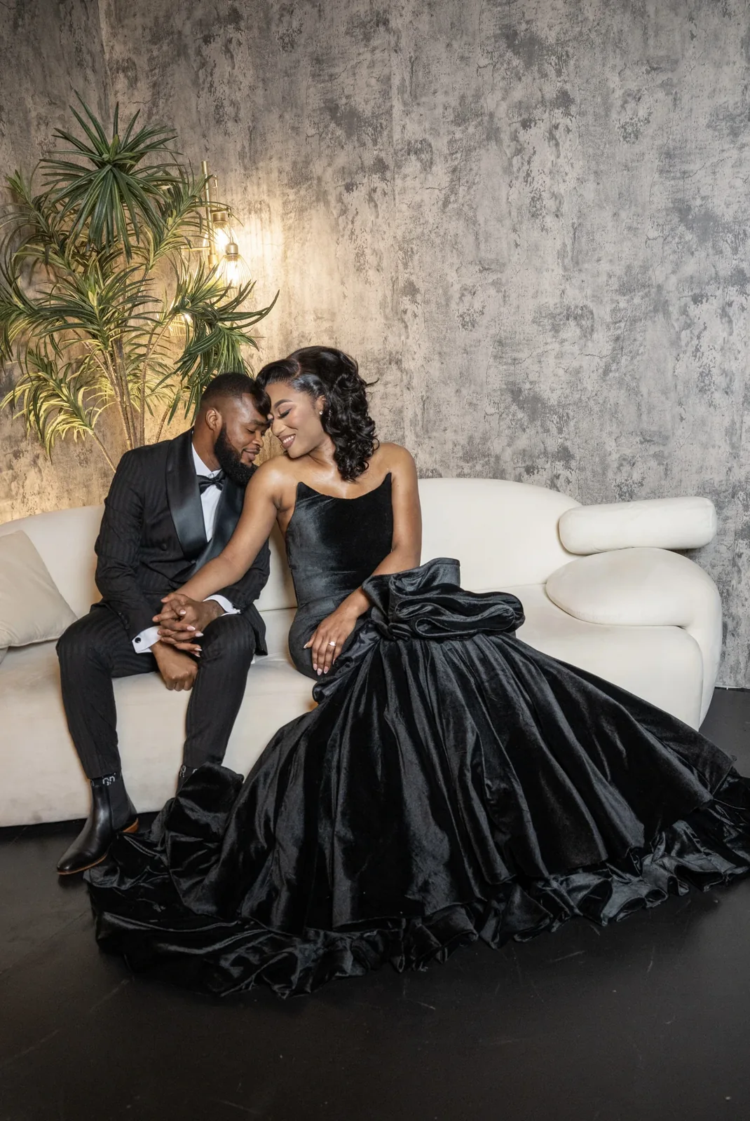 Forehead to forehead — a quiet, intimate smile